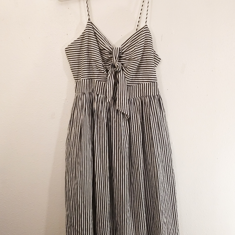 Zara , black and white zip up dress with cut out and tie detail on front